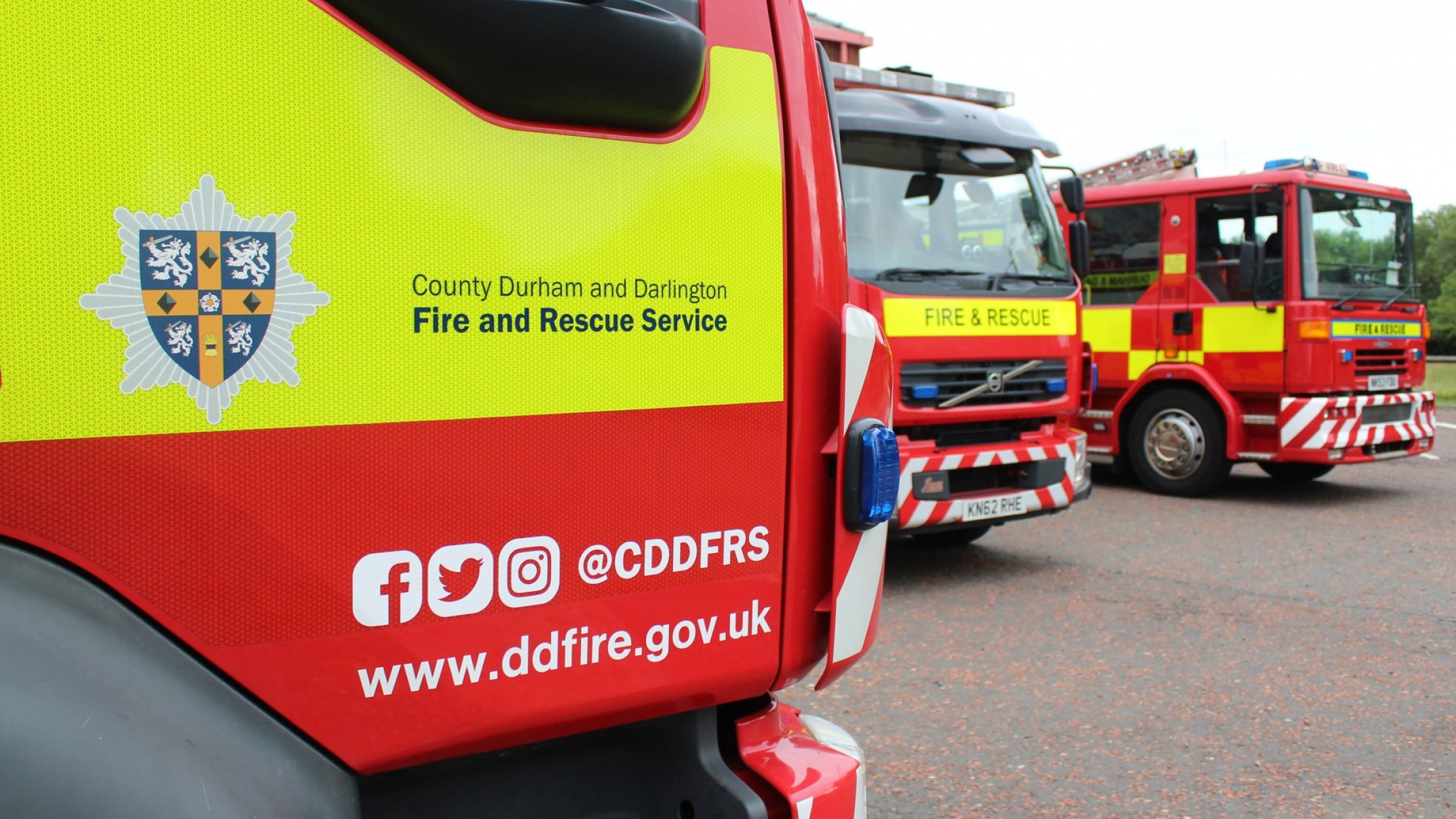 side of a fire appliance with website address and logo