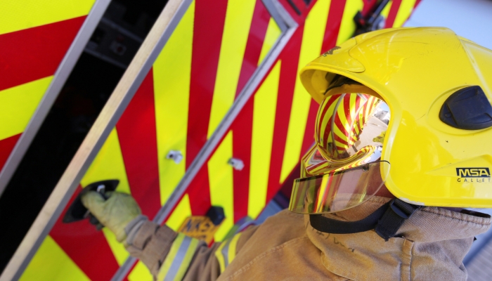 Firefighter using appliance