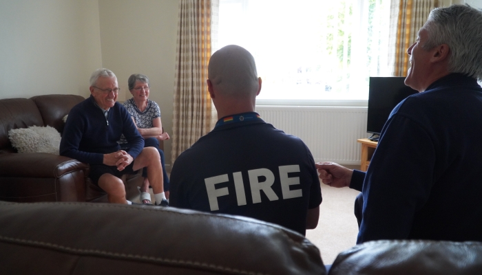 Firefighters talking during a Home Fire Safety Visit