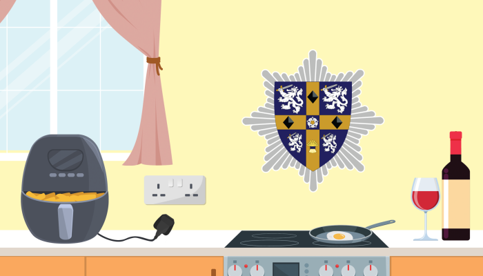 An illustration of a kitchen with the service crest on the wall