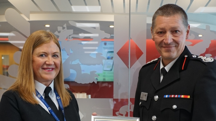 Sue Smart receiving Chief Fire Officers commendation from Steve Helps