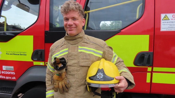 Firefighter Vince Crane wearing fire kit. 