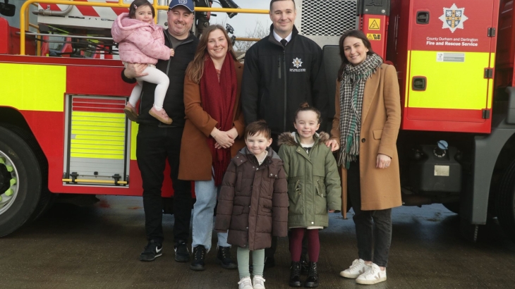 Station Manager Gary Tough with his family and Benny (front.) 