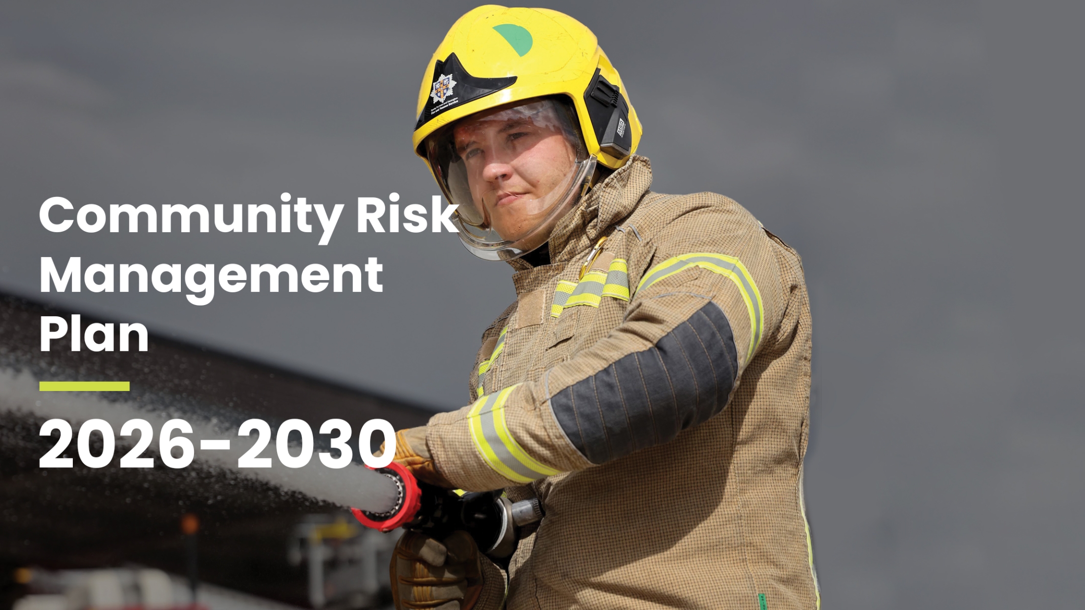 Community Risk management Plan 26-30 front cover picture featuring a firefighter spraying water 