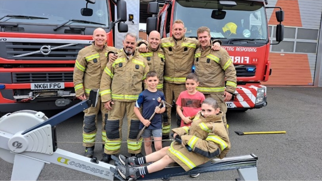 Gateshead Red watch and children on rowing machine