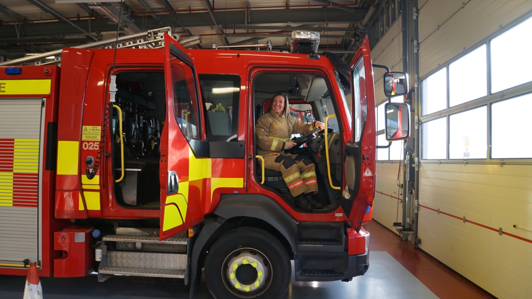 Firefighter in fire engine 