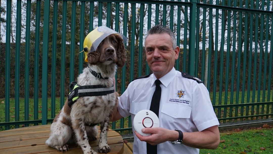 Fire Investigation Search Dog Handler Colin Davis with Woodie.