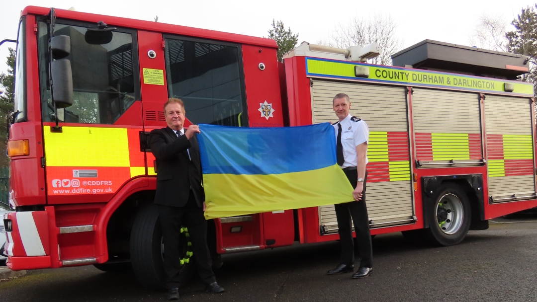 Chair of the Combined Fire Authority, Councillor John Shuttleworth and Chief Fire Officer Steve Helps with the engine that will be donated to Ukraine.