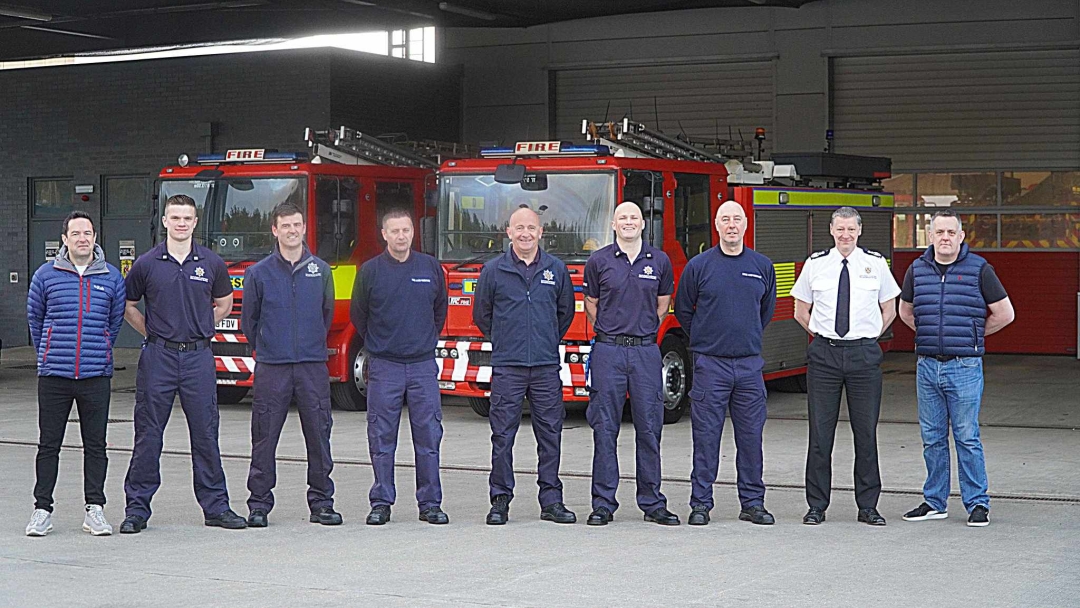 The firefighters who volunteered to drive the engines to Poland before they were donated to colleagues on the front line in Ukraine. 